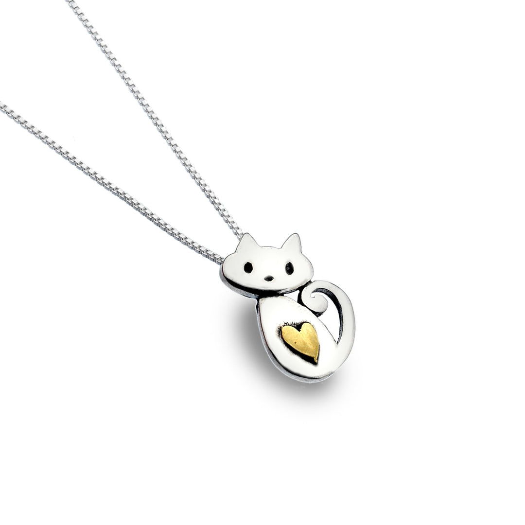 Cute kitten and brass heart pendant